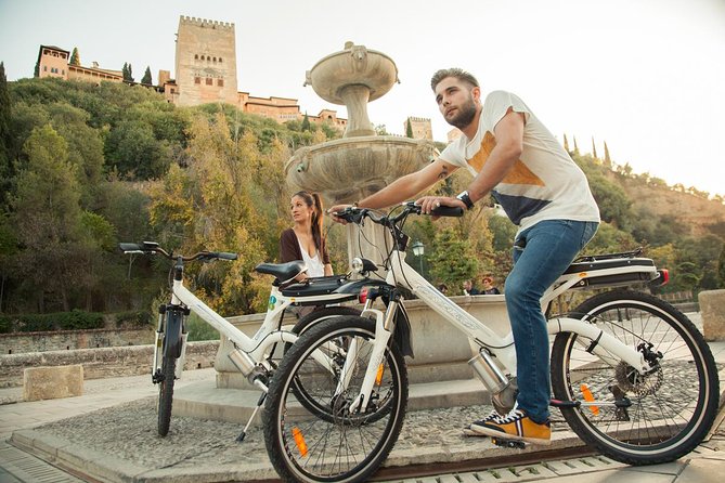 Albayzin and Sacromonte Electric Bike Tour in Granada - Paseo de los Tristes: Alhambra views and the Chirimias detail