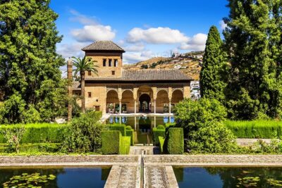 Alhambra Ticket and Guided Tour with Nasrid Palaces - Entering the Alhambra complex with a guide’s route in your head