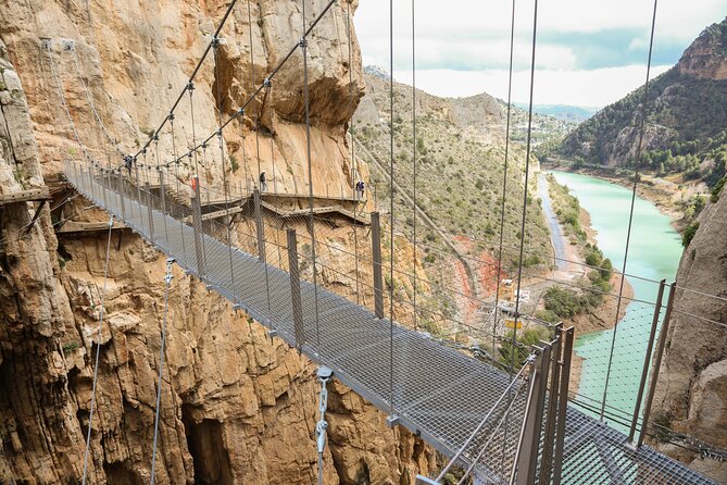 From Granada: Caminito del Rey Guided Tour & Guaranteed Tickets - North Access: tickets, helmets, and the first walk to the entrance