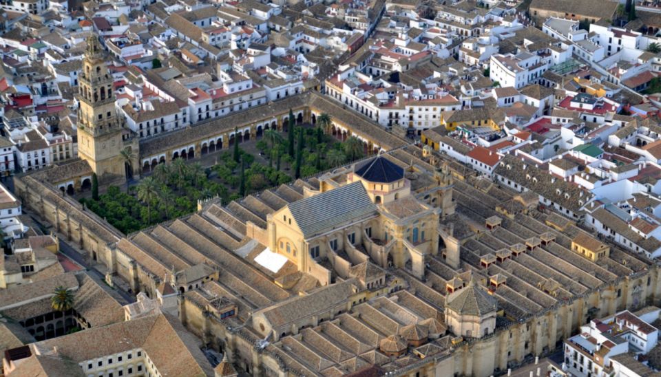 From Granada: Córdoba Day Trip with Mezquita Guided Tour - The Mezquita-Catedral guided visit: arches, mosaics, and a mosque-to-cathedral story