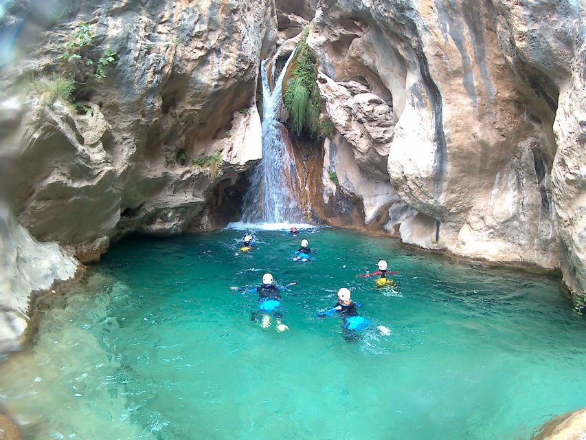 From Granada: Rio Verde Canyoning Tour - What you do in the canyon: rappel, jumps, slides, and that swim