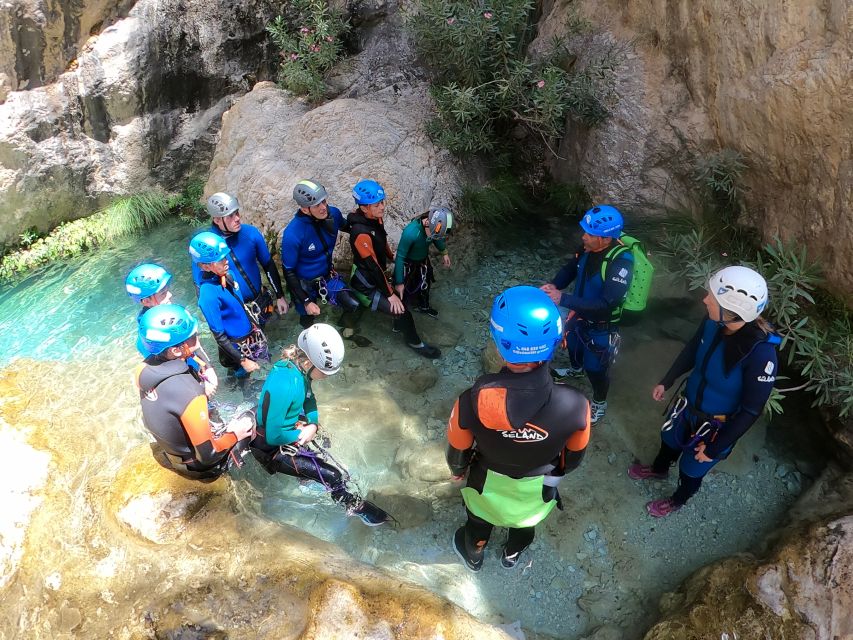 From Granada: Rio Verde Canyoning Tour with Lunch - The 3-hour canyoning time: slides, pool jumps, and waterfall rappels