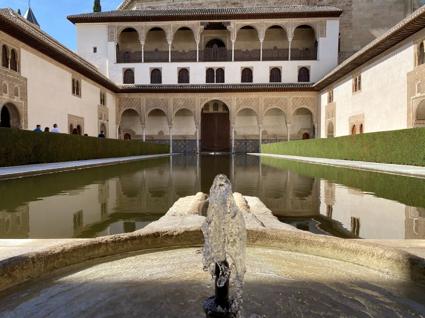 Granada: Alhambra, Alcazaba, and Generalife Private Tour - Charles V Palace: The Surprise Contrast Inside the Complex