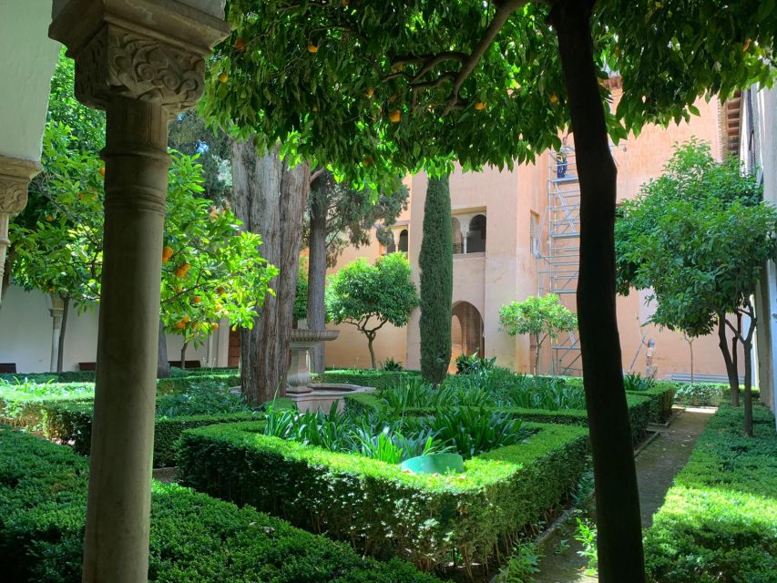 Granada: Alhambra Guided Tour w/ Nasrid Palaces & City Pass - Getting around with included buses and a tourist train ride