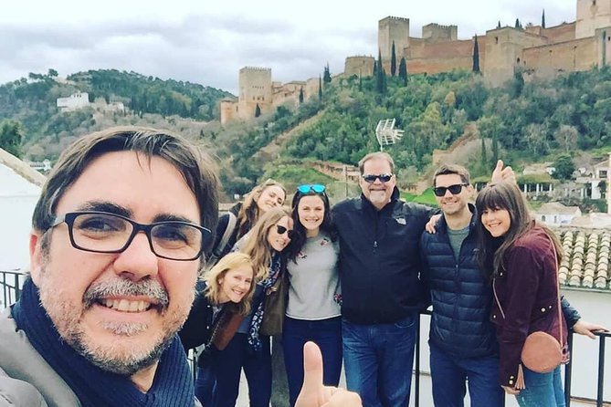 Granada Private Tapas & Walking Tour - Corral del Carbón streets: Nasrid-era lanes and spices you can almost smell