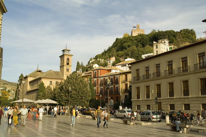 Granada Private Walking Tour with Cathedral & Royal Chapel - Plaza Nueva, an Islamic religious school stop, and the pause between quarters