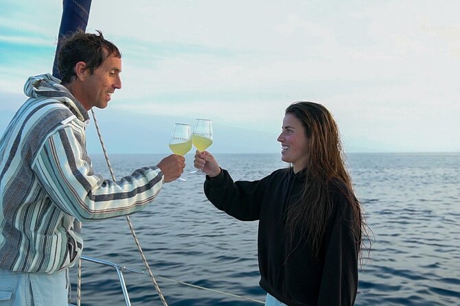 Sailing at sunset along the cliffs of Maro-Compartida - Maro-Compartida at golden hour: why this sail feels different