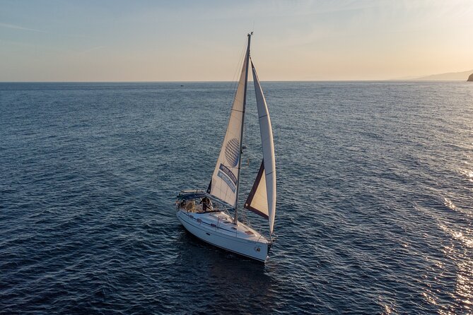Sailing at sunset along the cliffs of Maro-Compartida - The Maro-Cerro Gordo coves: where the “wild” feeling comes from