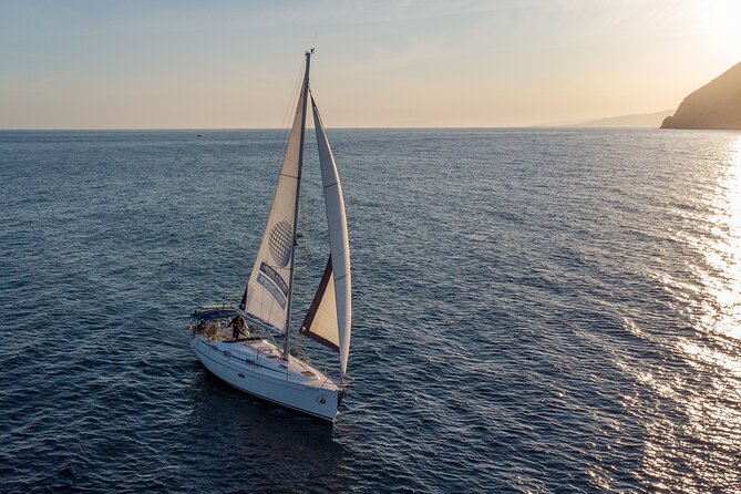 Sunset sailing along the cliffs of Maro- Private - Sailing the Maro-Cerro Gordo Cliffs: Coves, Clear Water, and Sea Life